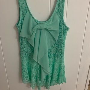 Turquoise lace tank top with bow on back size med